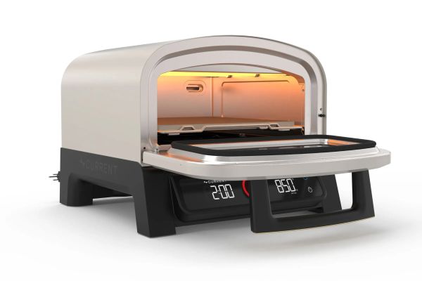 Als je een pizza bakt moet je algauw een minuut of 12 wachten voor je ronde hoofdgerecht lekker gebakken is. Duurt je dat te lang, dan biedt een nieuwe slimme, kleine oven een oplossing.